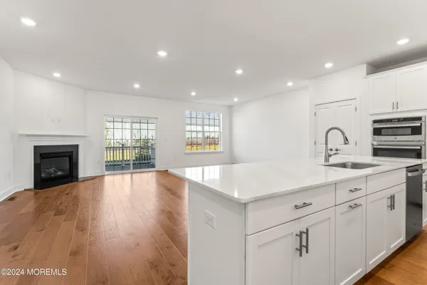 a view of a kitchen with electric appliances