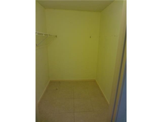 567 Trace Circle, Unit 110 Deerfield Beach, FL 33441 - Photo 8 of 8 a bathroom with a shower