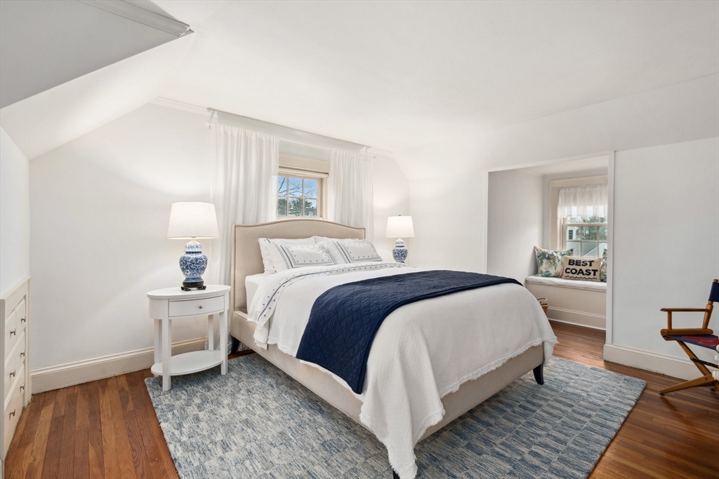 12 Cherry Lane Dedham, MA 02026 - Photo 22 of 37 a bedroom with a bed and a night stand