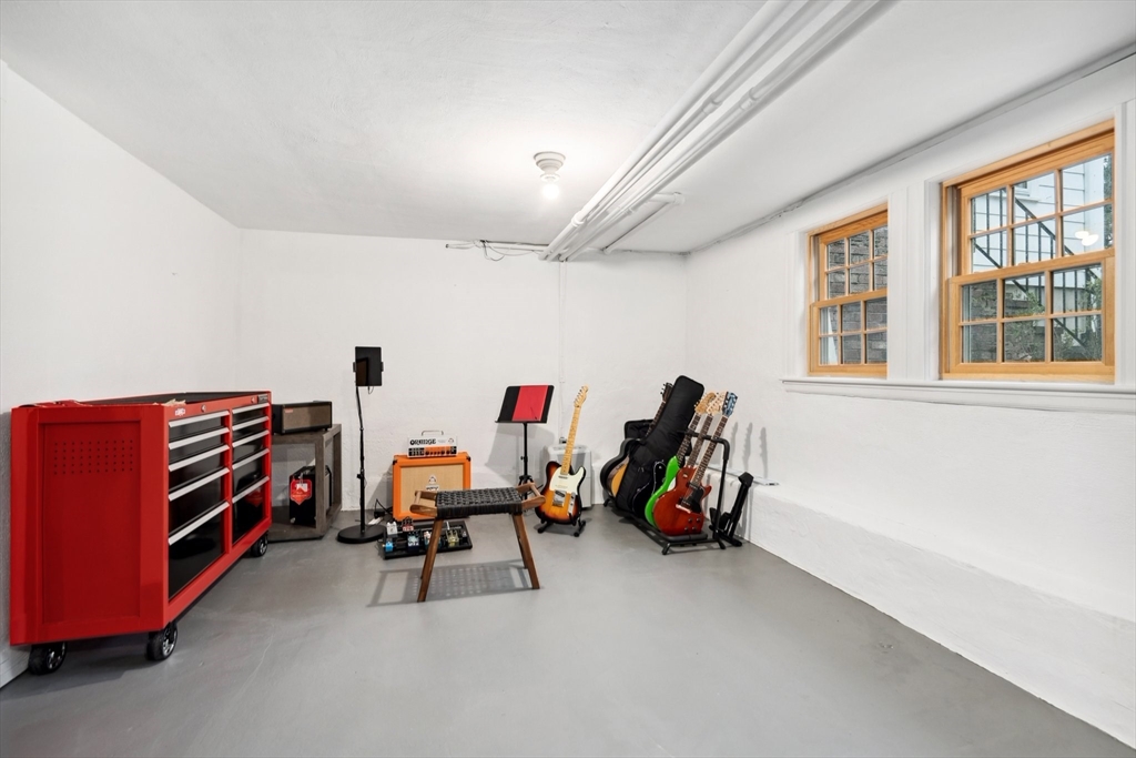 12 Cherry Lane Dedham, MA 02026 - Photo 31 of 37 a view of a room with furniture and windows
