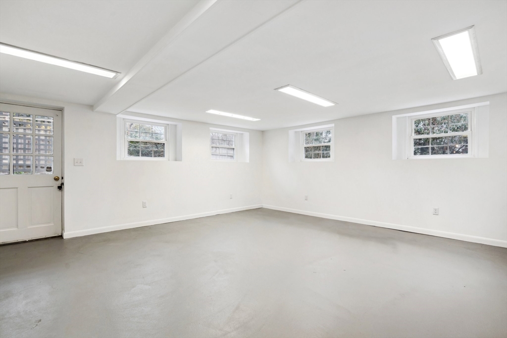 12 Cherry Lane Dedham, MA 02026 - Photo 32 of 37 a view of an empty room with a window