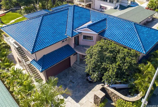 a backyard of a house with lots of green space