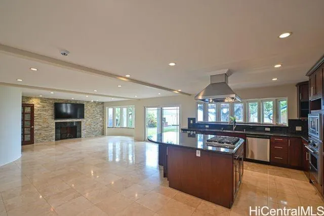 a view of a kitchen and dining table