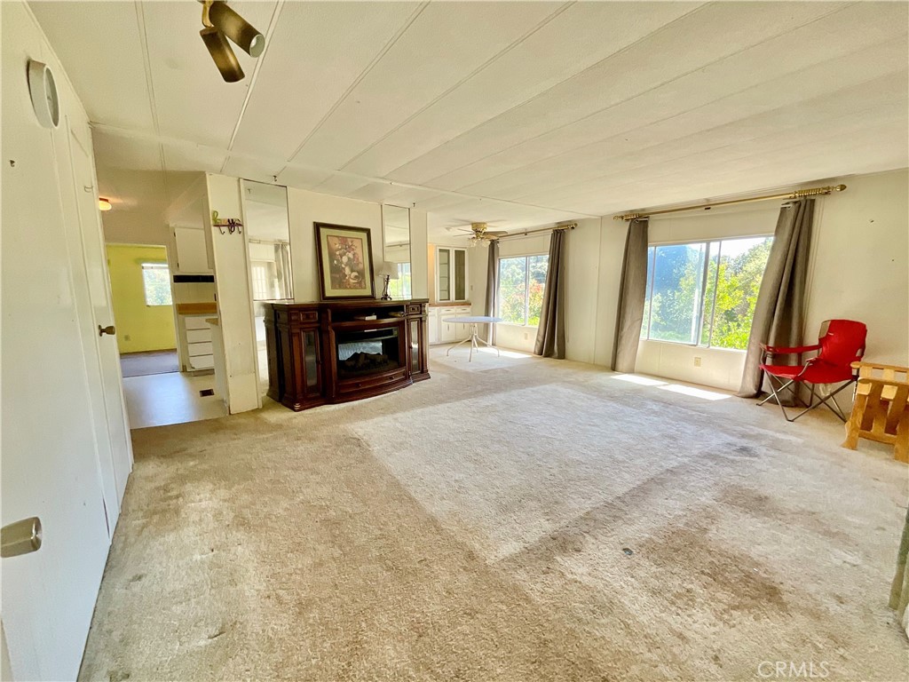 7282 Marin Street Nice, CA 95464 - Photo 65 of 69 a large spacious bedroom with a large bed and dresser