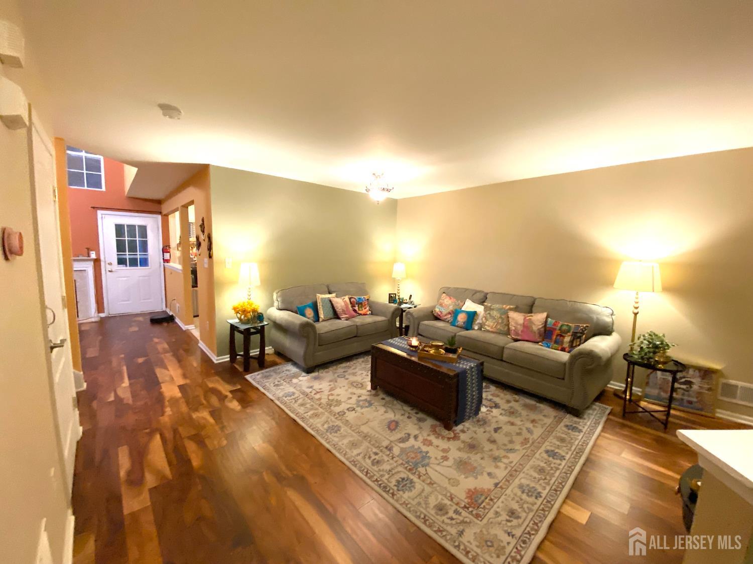 228 Hawthorne Road North Brunswick, NJ 08902 - Photo 3 of 23 a living room with furniture and a couch
