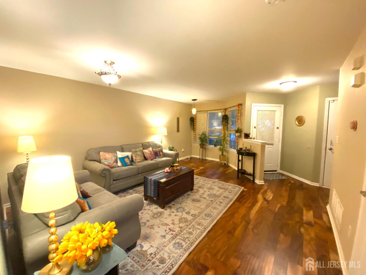 228 Hawthorne Road North Brunswick, NJ 08902 - Photo 4 of 23 a living room with furniture and a couch