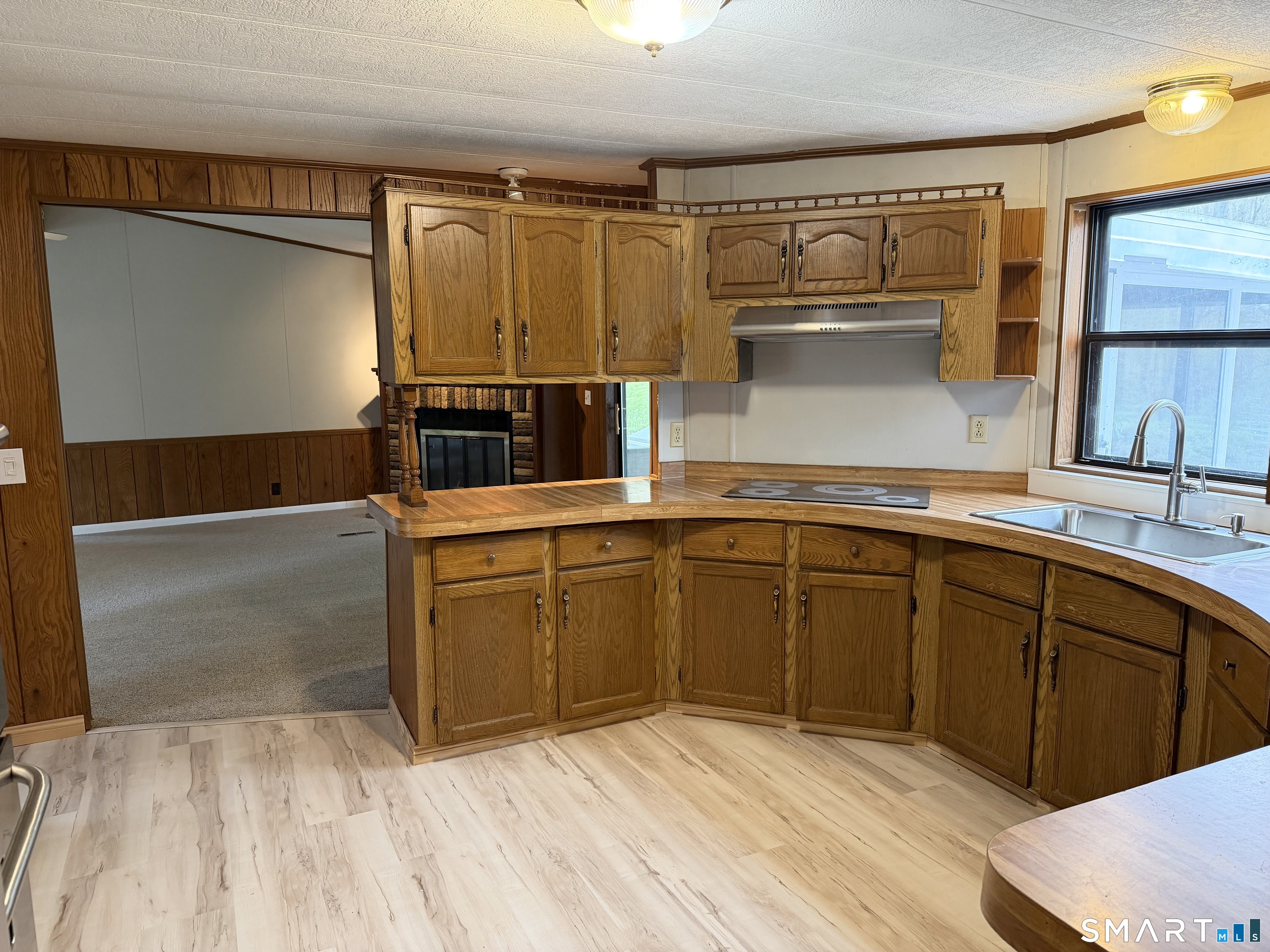 65 Colchester Cmns Colchester, CT 06415 - Photo 11 of 40 Kitchen open to living room