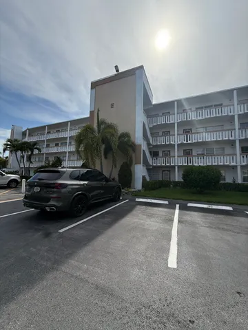 a car parked in front of a building