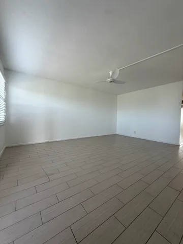 a view of a kitchen with a sink and a stove top oven