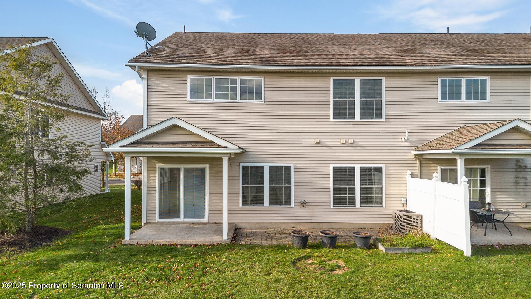 192 Shadow Wood Circle Archbald, PA 18403 - Photo 18 of 55 a front view of a house with a yard