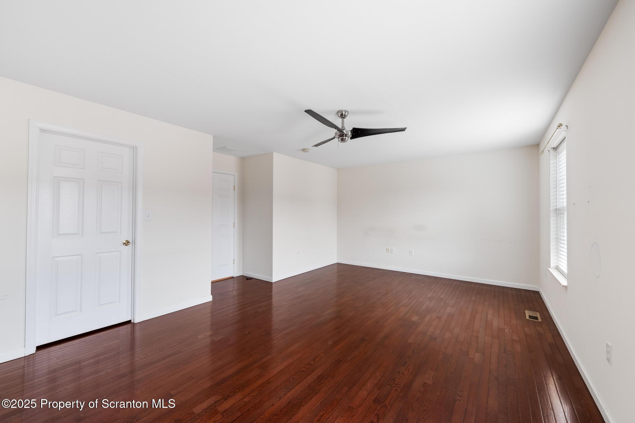 192 Shadow Wood Circle Archbald, PA 18403 - Photo 24 of 55 a view of a room with wooden floor