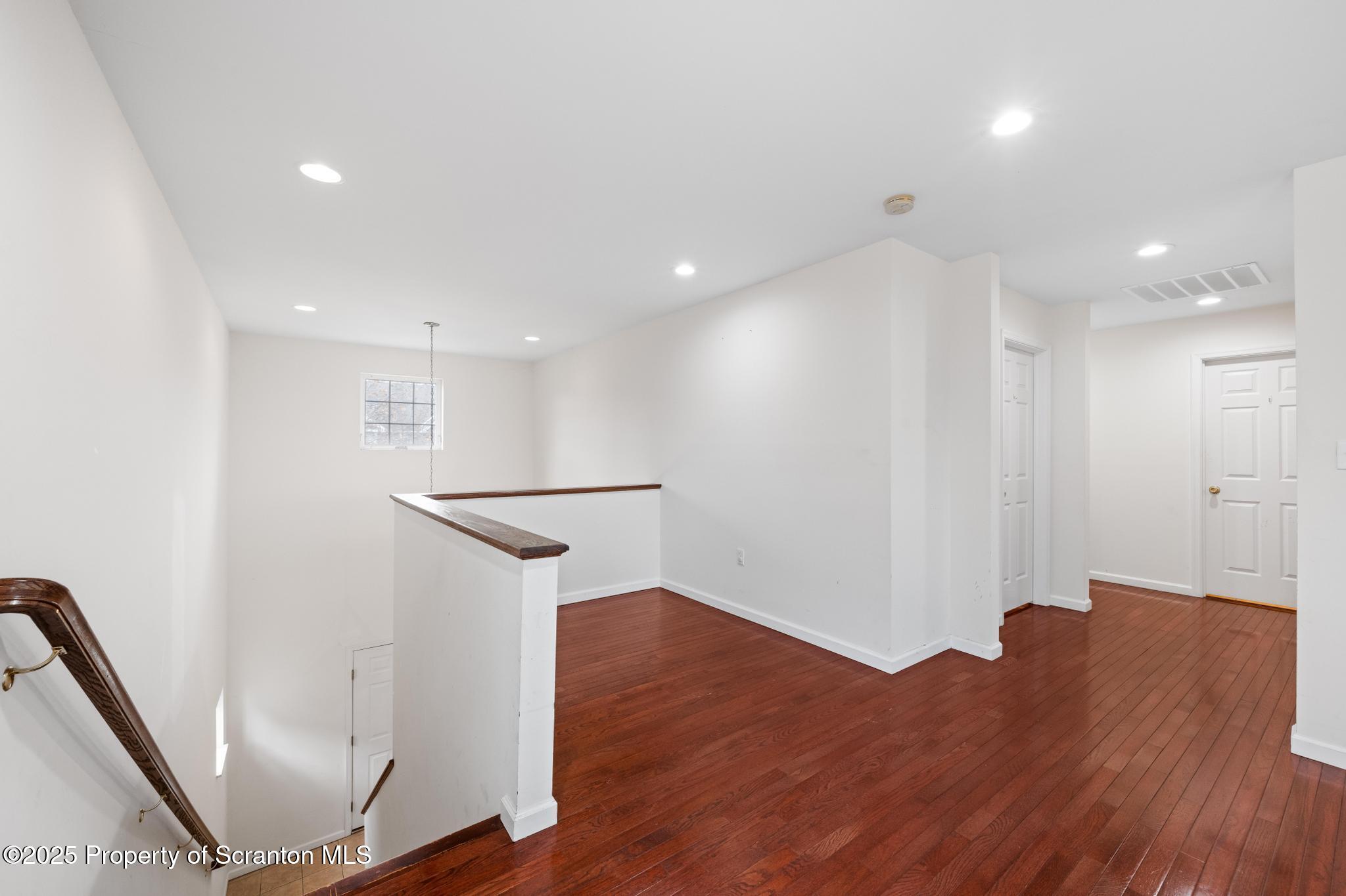 192 Shadow Wood Circle Archbald, PA 18403 - Photo 42 of 55 a view of a hallway with wooden floor