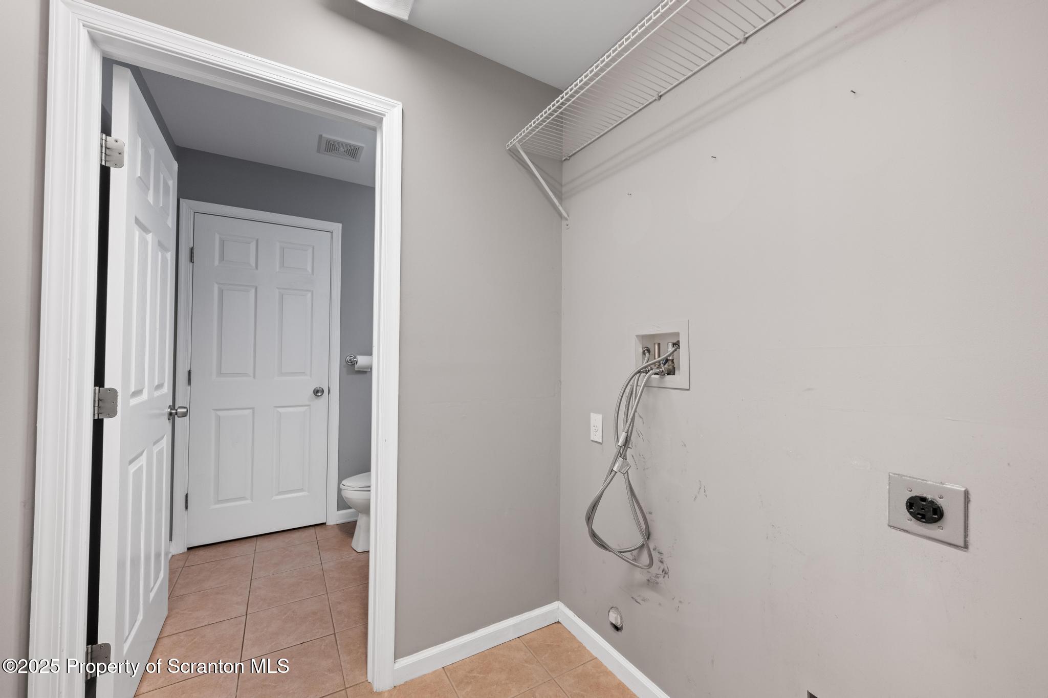 192 Shadow Wood Circle Archbald, PA 18403 - Photo 46 of 55 a bathroom with a glass shower door