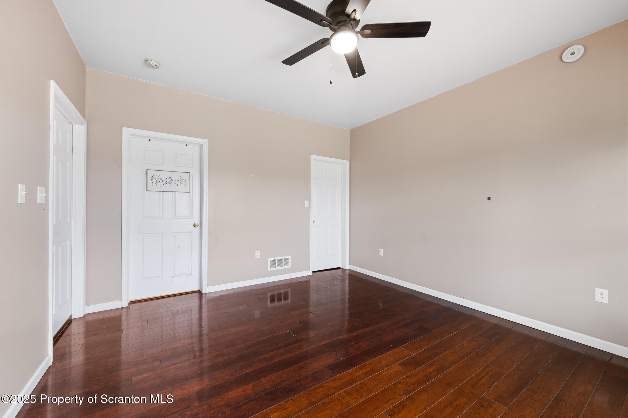 192 Shadow Wood Circle Archbald, PA 18403 - Photo 50 of 55 a view of empty room with wooden floor