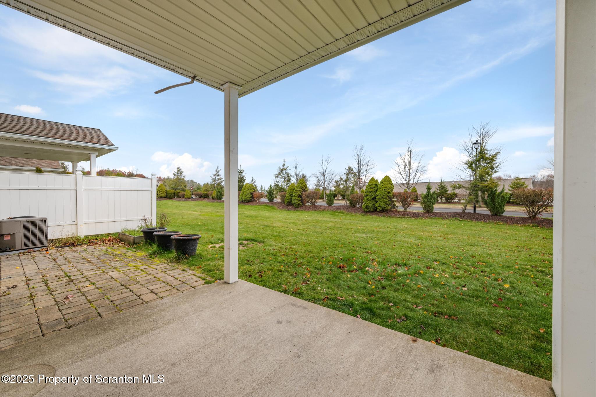 192 Shadow Wood Circle Archbald, PA 18403 - Photo 52 of 55 a view of a porch with a yard