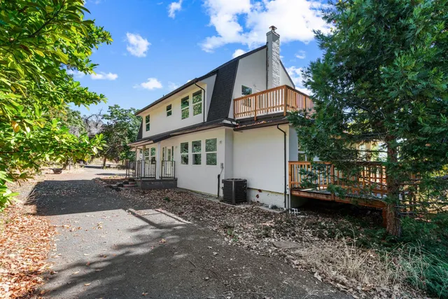 a view of house with outdoor space