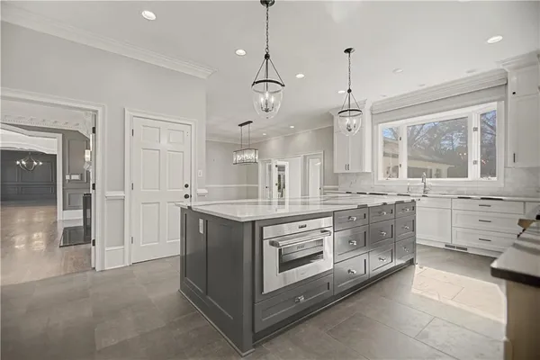a bathroom with a sink double vanity and a mirror