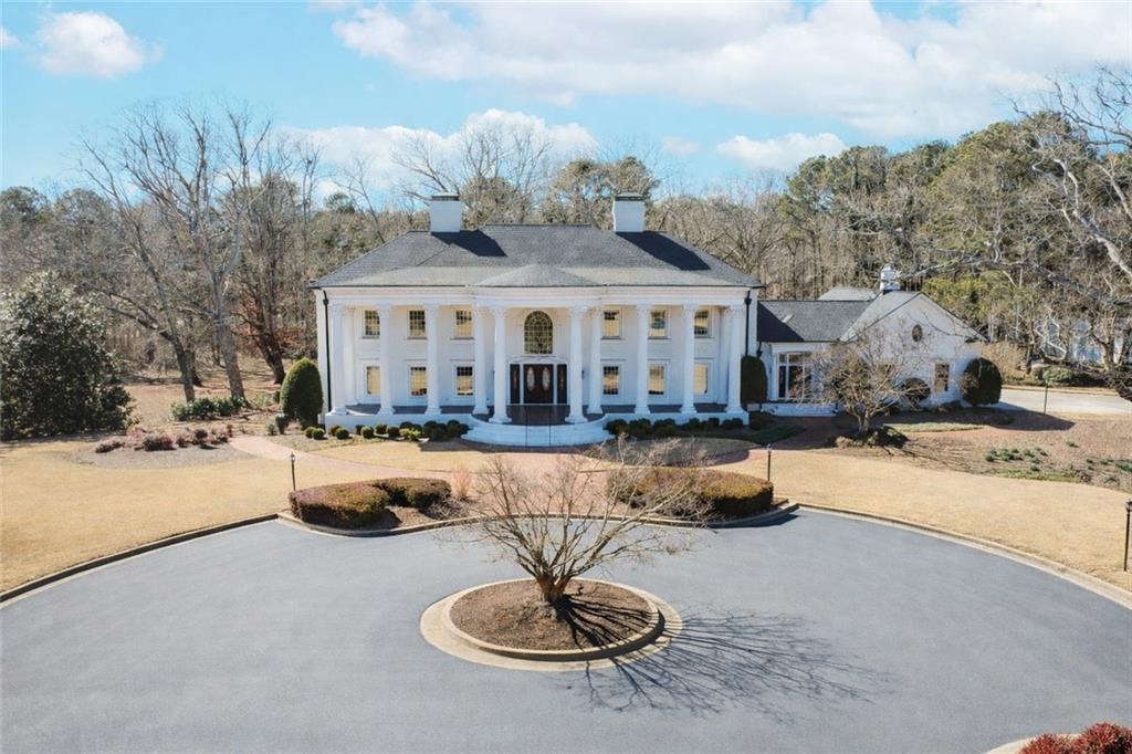1445 Hillside Drive Southwest Grayson, GA 30017 - Photo 2 of 85 a swimming pool view with a seating space