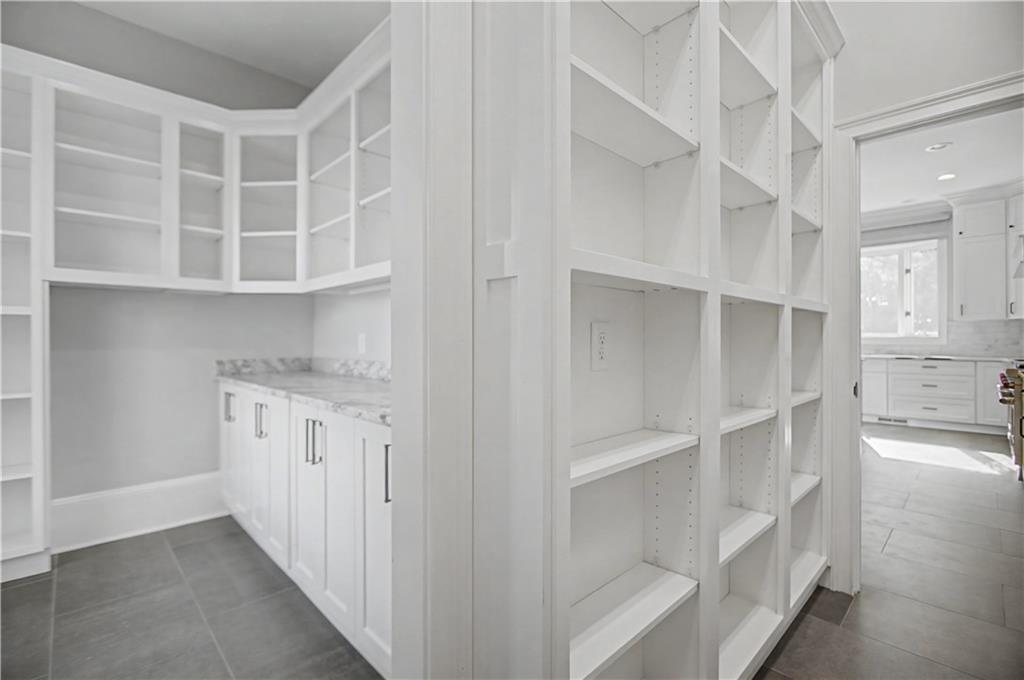 1445 Hillside Drive Southwest Grayson, GA 30017 - Photo 25 of 85 a view of an empty walk in closet