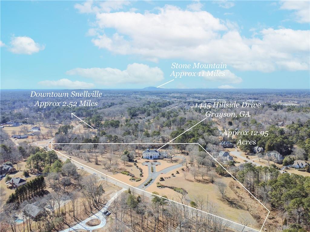 1445 Hillside Drive Southwest Grayson, GA 30017 - Photo 3 of 85 an aerial view of residential building and city view