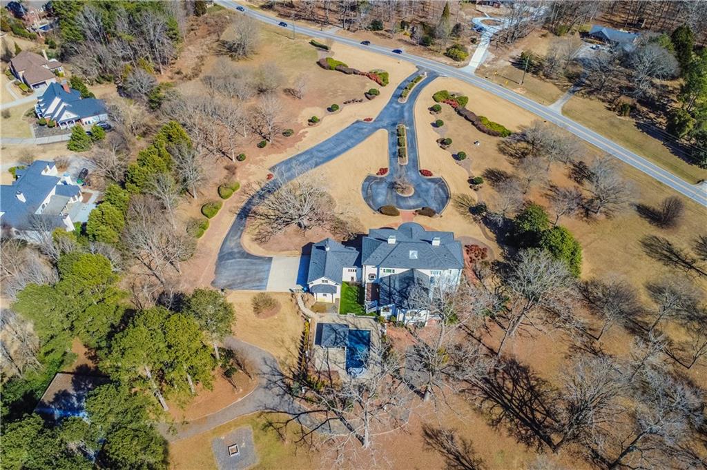 1445 Hillside Drive Southwest Grayson, GA 30017 - Photo 4 of 85 an aerial view of residential houses with outdoor space