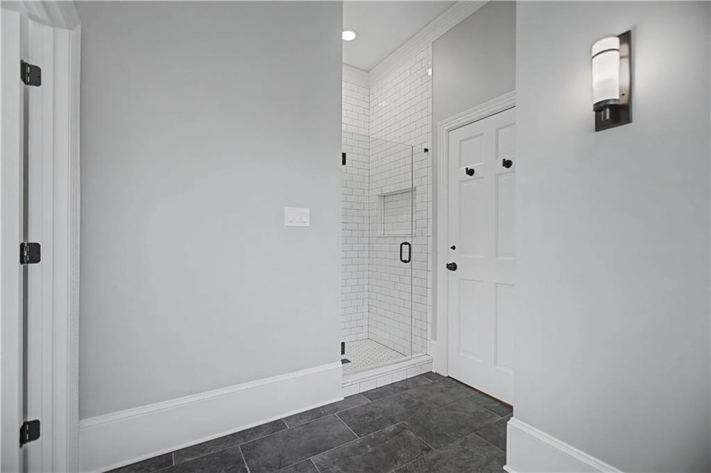 1445 Hillside Drive Southwest Grayson, GA 30017 - Photo 45 of 85 a view of a bathroom with a shower