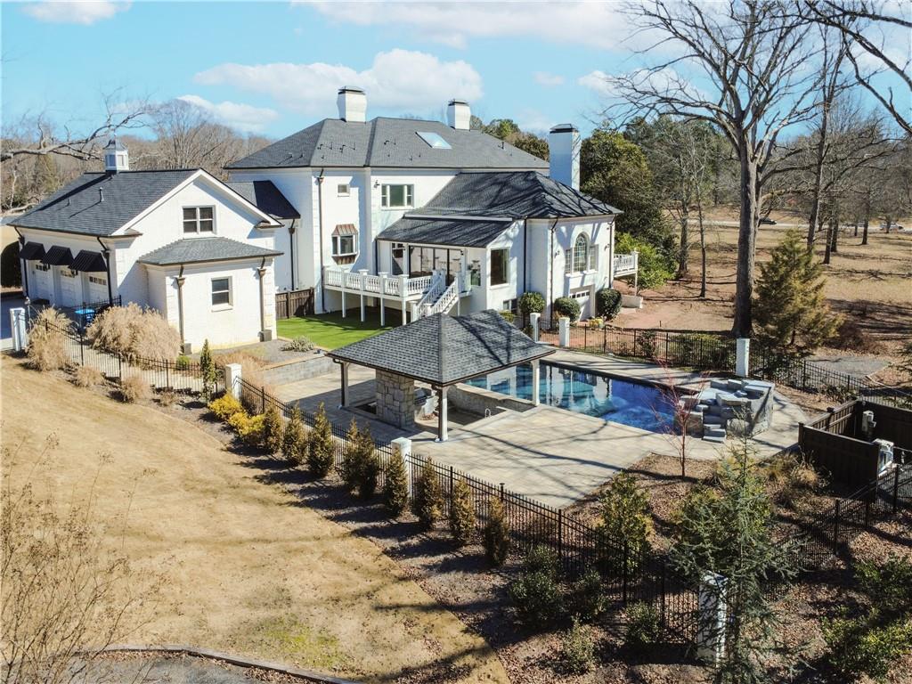 1445 Hillside Drive Southwest Grayson, GA 30017 - Photo 5 of 85 a view of a house with backyard porch and sitting area