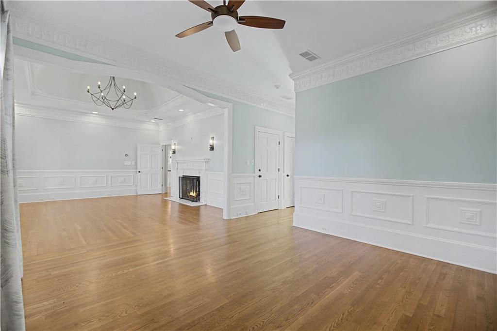 1445 Hillside Drive Southwest Grayson, GA 30017 - Photo 51 of 85 wooden floor in an empty room