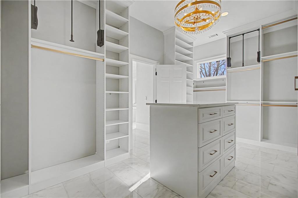 1445 Hillside Drive Southwest Grayson, GA 30017 - Photo 56 of 85 a view of an empty walk in closet