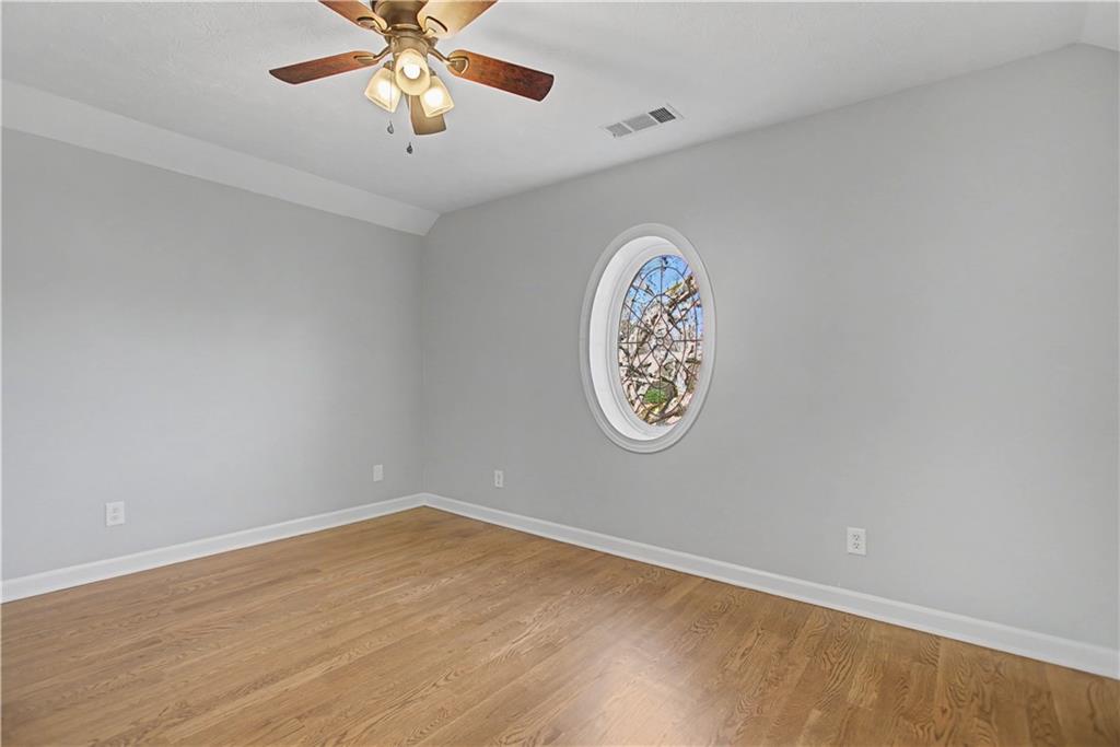 1445 Hillside Drive Southwest Grayson, GA 30017 - Photo 61 of 85 a view of a hallway with a window