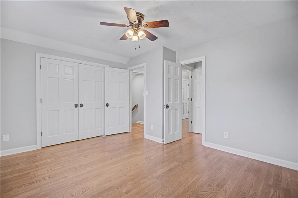 1445 Hillside Drive Southwest Grayson, GA 30017 - Photo 62 of 85 a view of an empty room with a fan