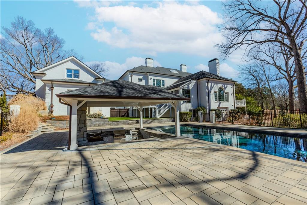 1445 Hillside Drive Southwest Grayson, GA 30017 - Photo 80 of 85 a front view of a house with yard outdoor seating and barbeque oven