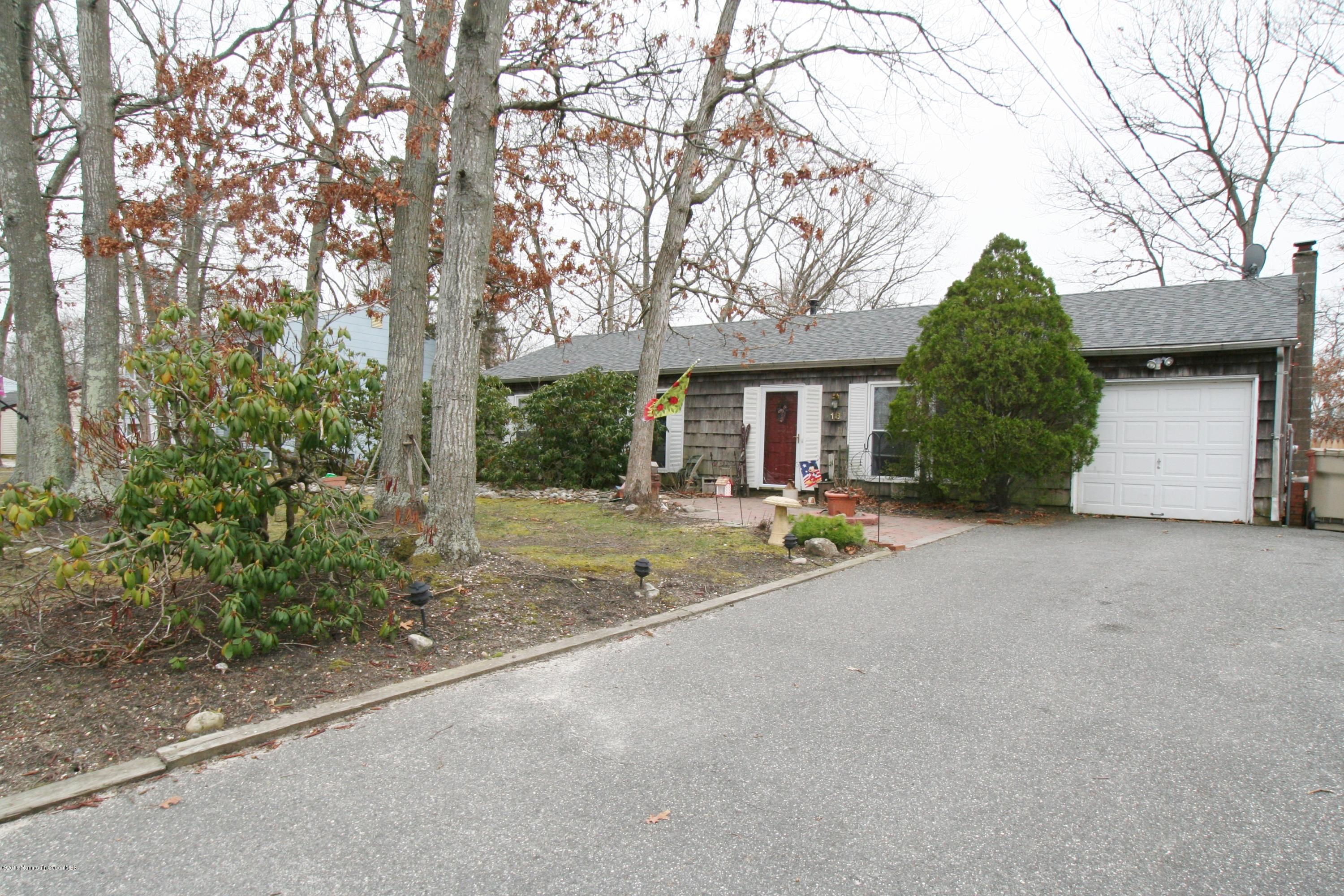 18 Cranmer Road Bayville, NJ 08721 - Photo 2 of 14 a view of outdoor space and yard