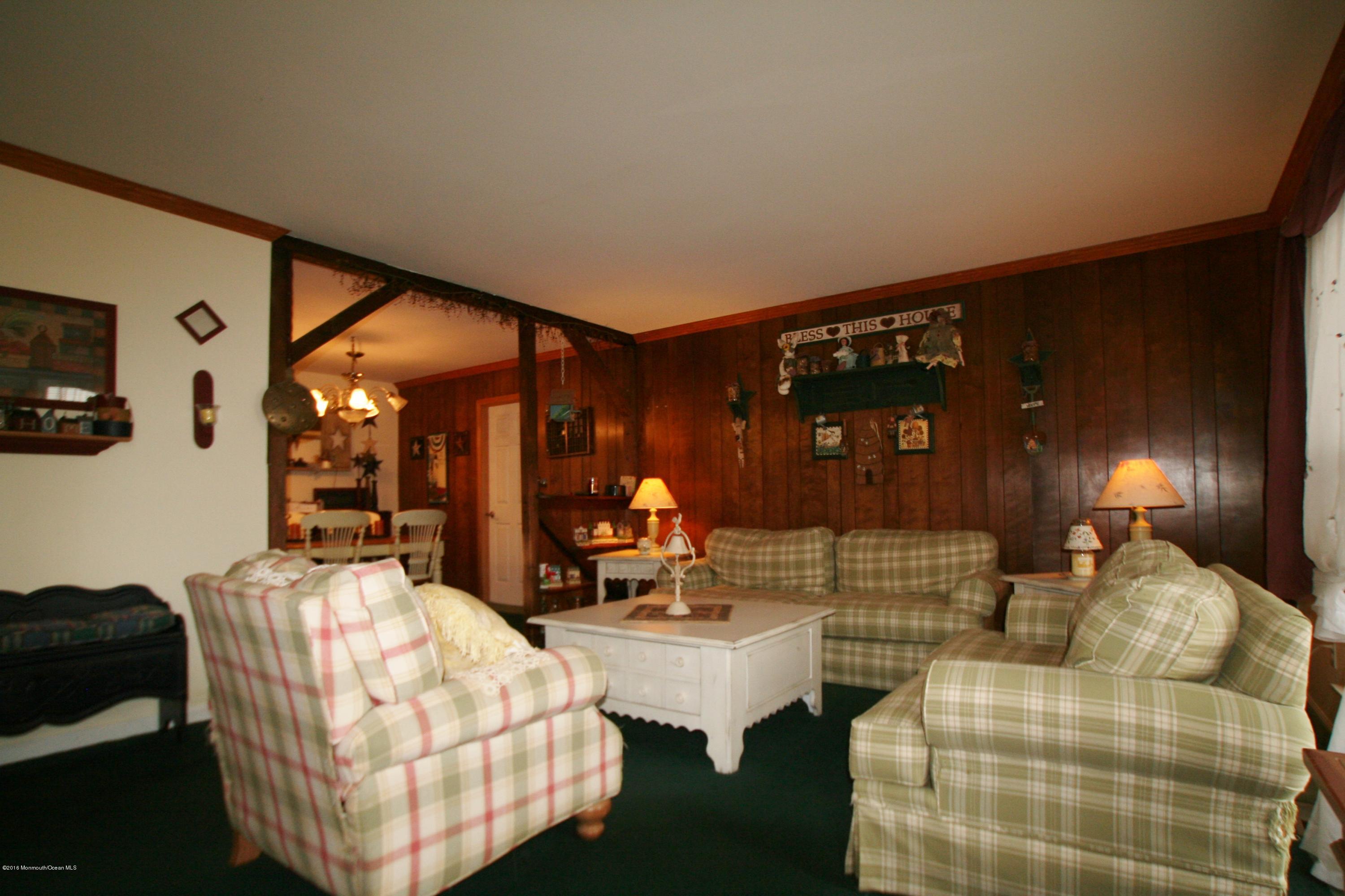 18 Cranmer Road Bayville, NJ 08721 - Photo 4 of 14 a living room with furniture and lamp