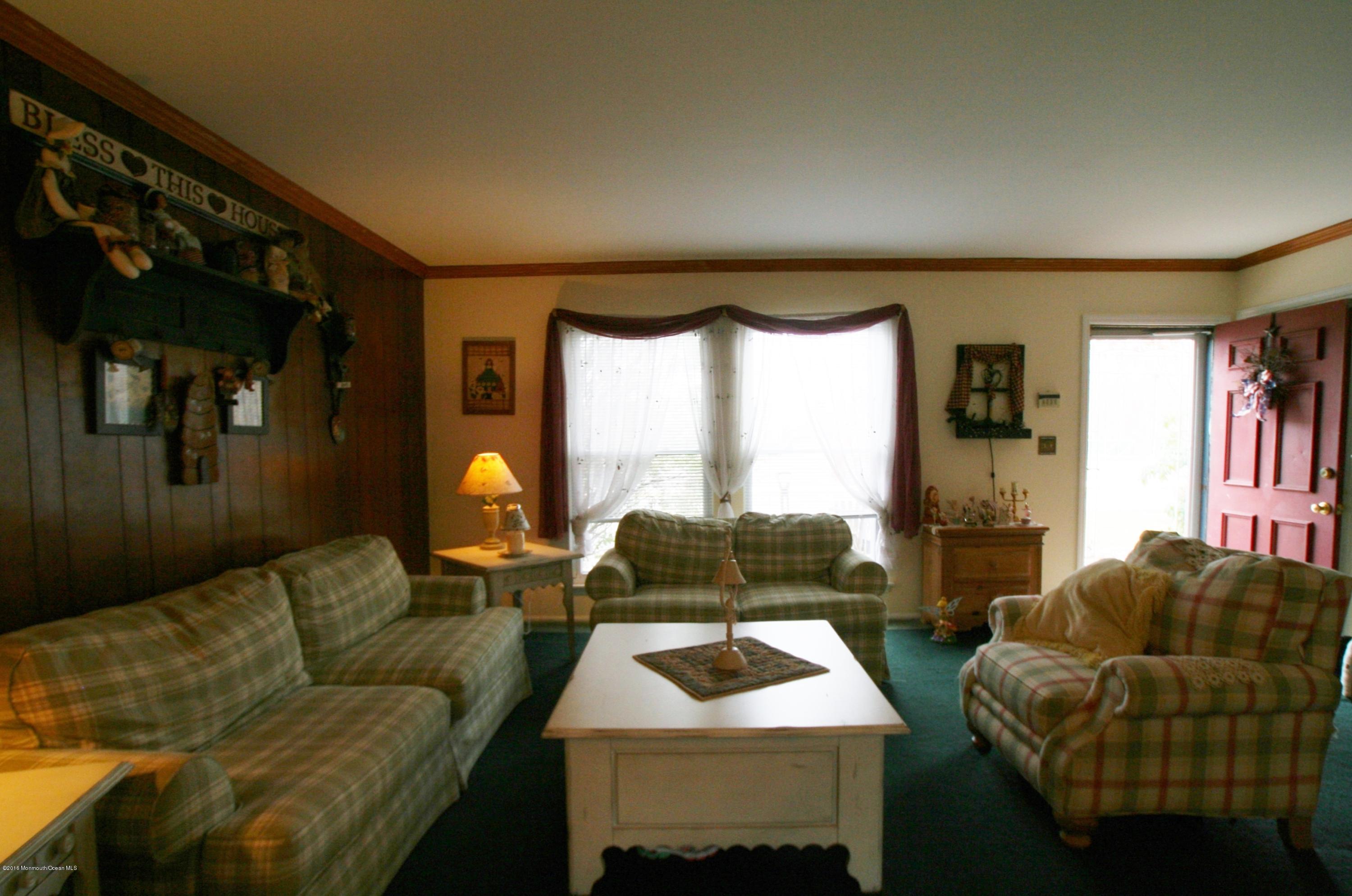 18 Cranmer Road Bayville, NJ 08721 - Photo 5 of 14 a living room with furniture and a window