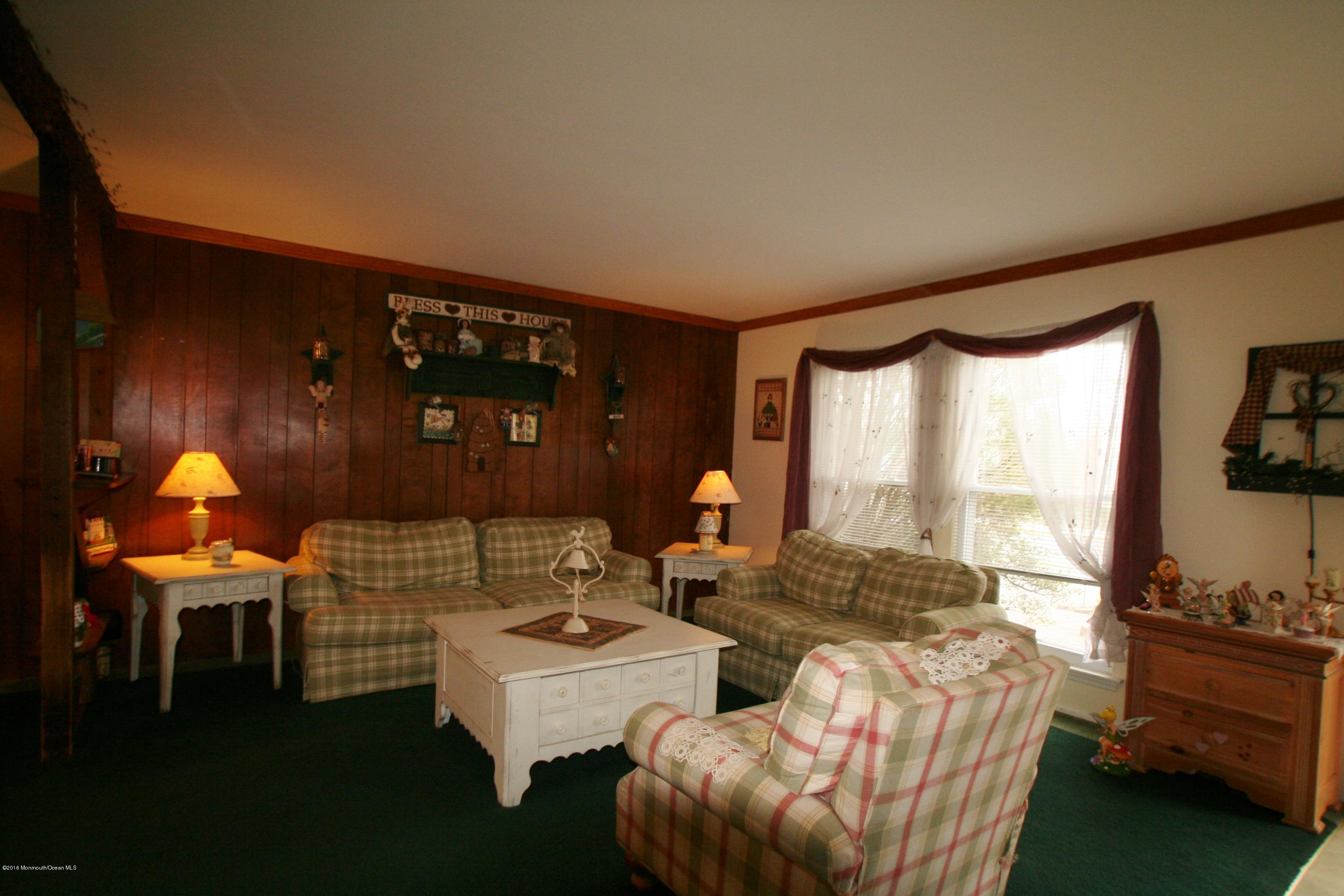 18 Cranmer Road Bayville, NJ 08721 - Photo 6 of 14 a living room with furniture and a window