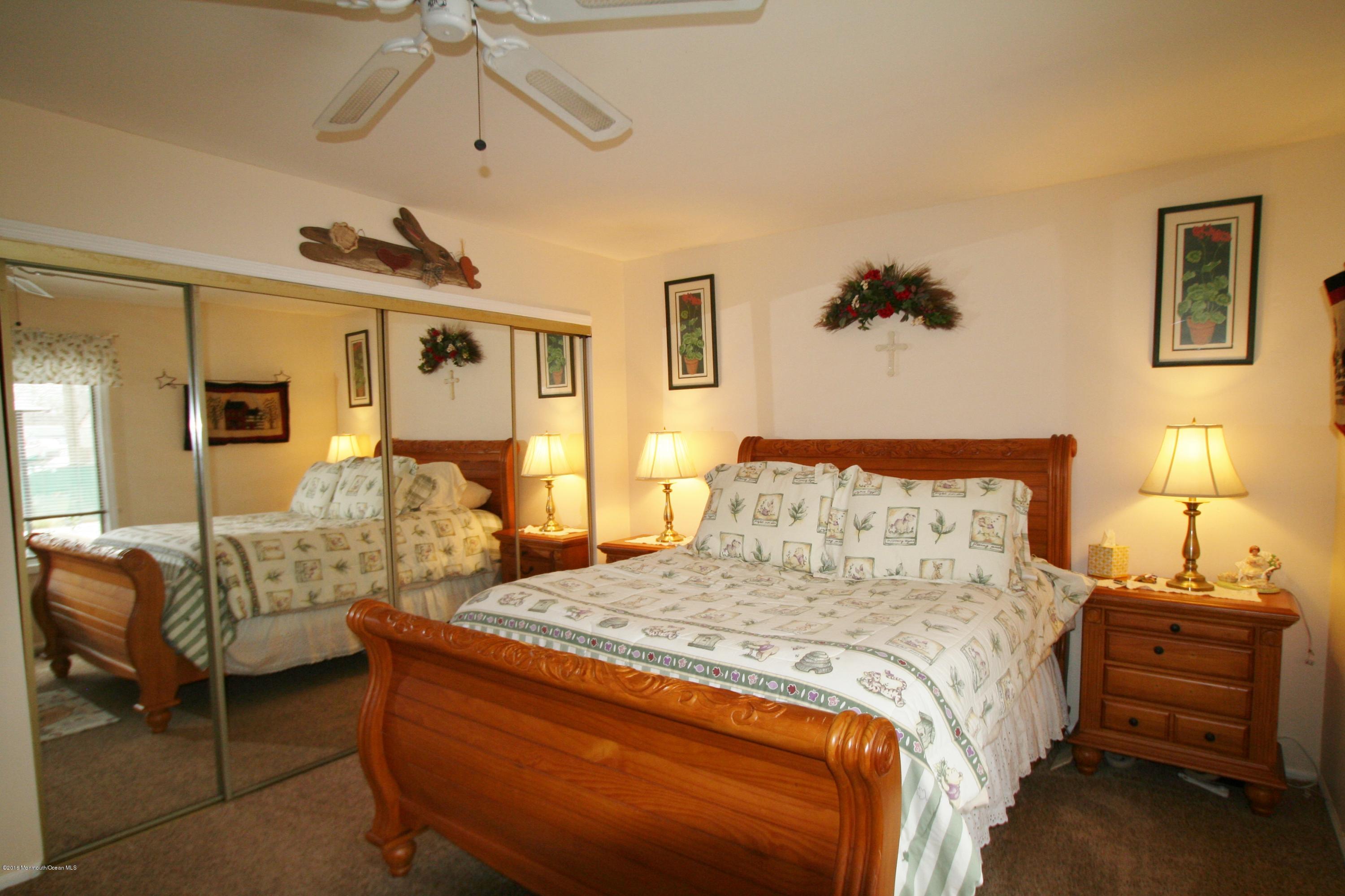 18 Cranmer Road Bayville, NJ 08721 - Photo 8 of 14 a bedroom with bed and window