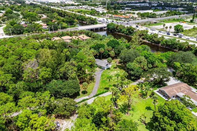 a view of a garden with a lake
