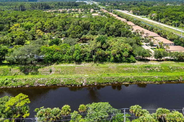 a view of a garden with a building