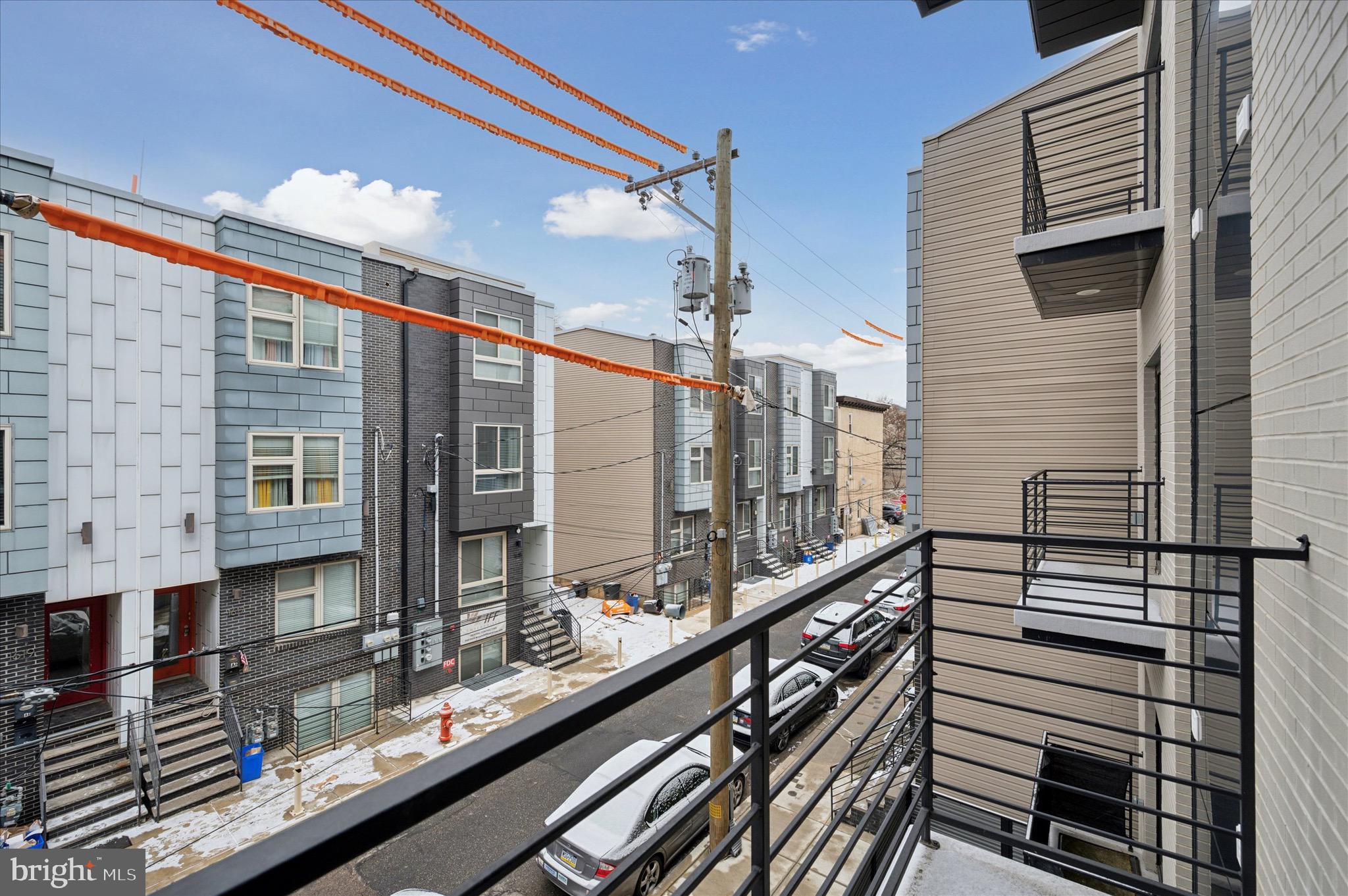 1617-19 Ridge Avenue, Unit C Philadelphia, PA 19130 - Photo 13 of 26 a view of a balcony with a potted plant on a street