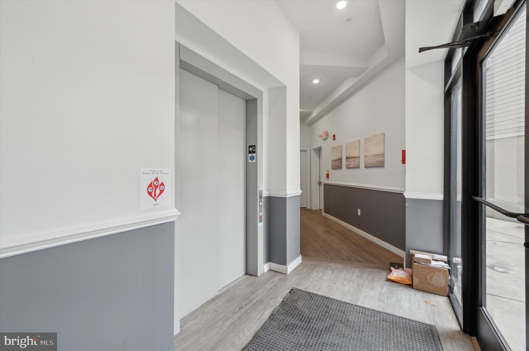 1617-19 Ridge Avenue, Unit C Philadelphia, PA 19130 - Photo 2 of 26 a room with gym equipment and a view of living room
