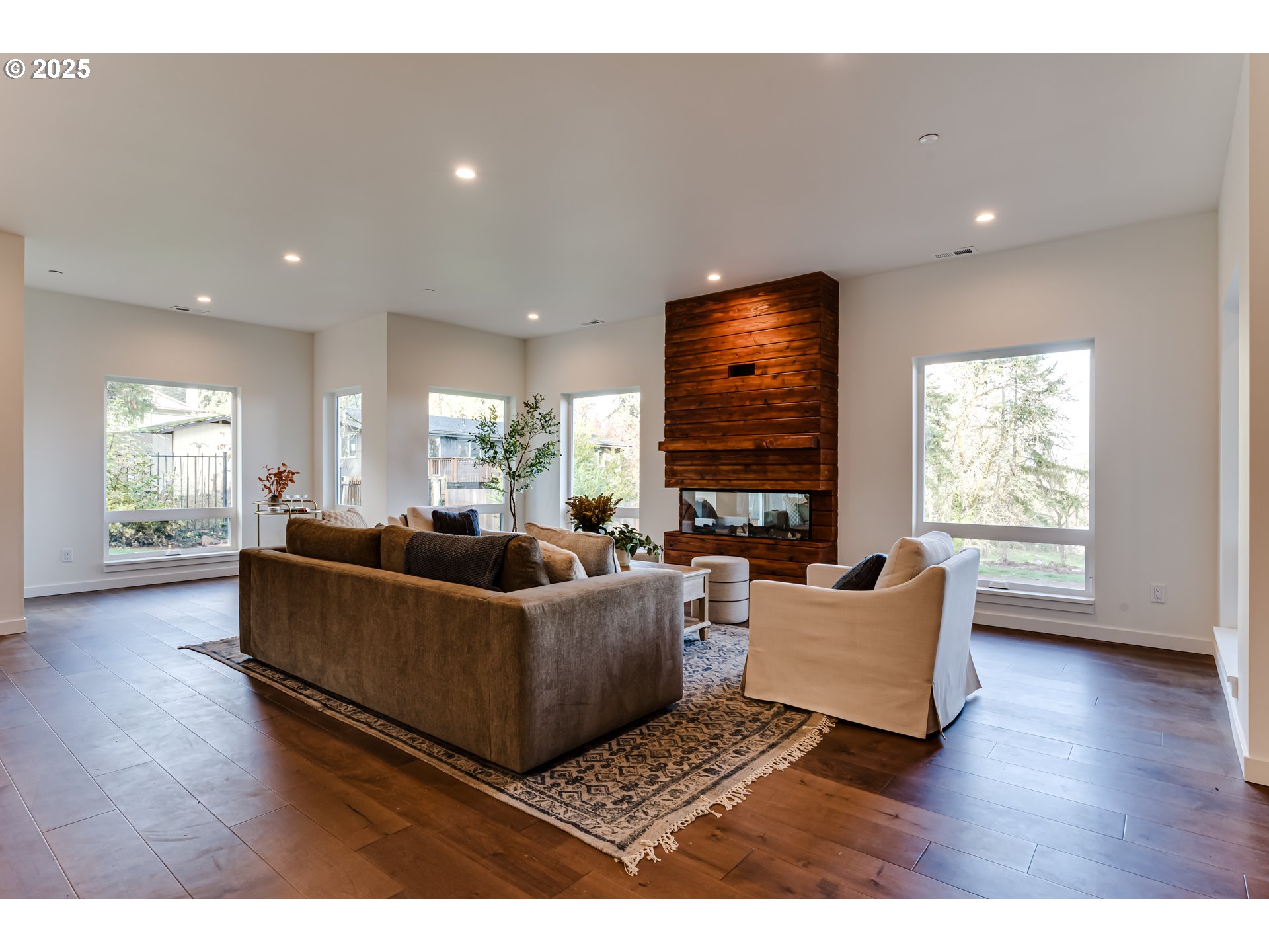 2240 West 25th Place Eugene, OR 97405 - Photo 14 of 48 a living room with furniture window and wooden floor