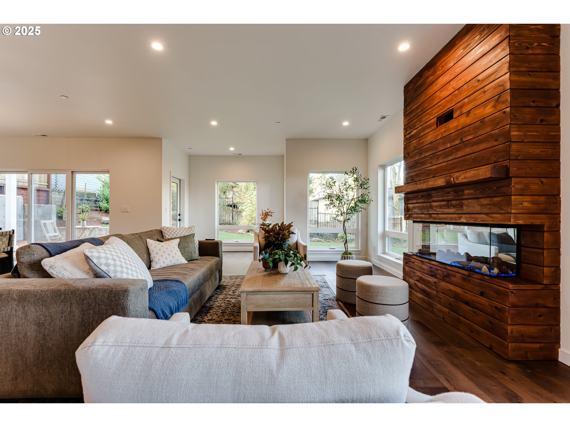 2240 West 25th Place Eugene, OR 97405 - Photo 18 of 48 a living room with furniture a large window and a chandelier