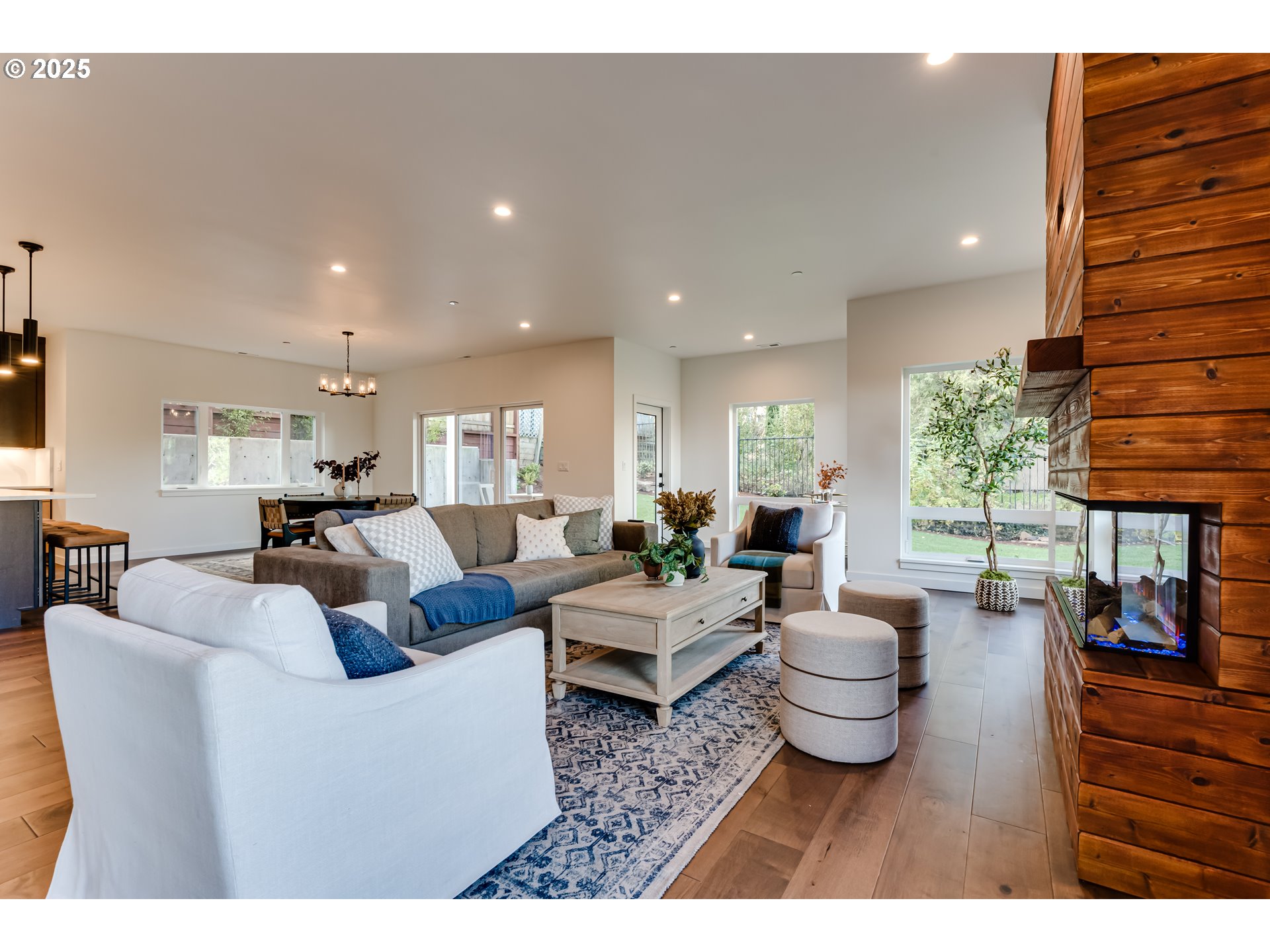2240 West 25th Place Eugene, OR 97405 - Photo 19 of 48 a living room with furniture a lamp and a potted plant