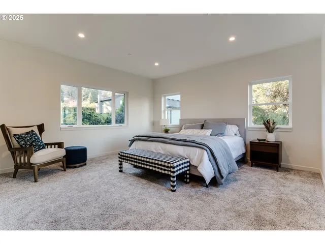 an aerial view of residential house with outdoor space and swimming pool