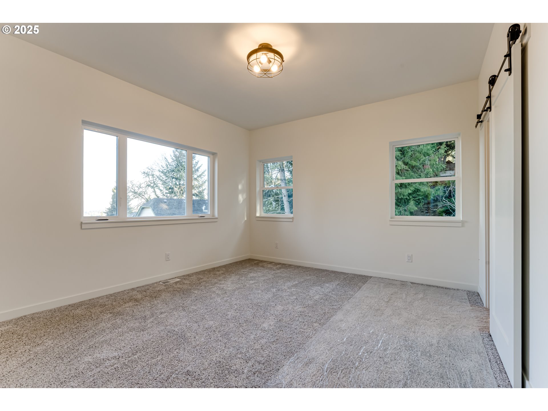 2240 West 25th Place Eugene, OR 97405 - Photo 35 of 48 a view of an empty room with a window