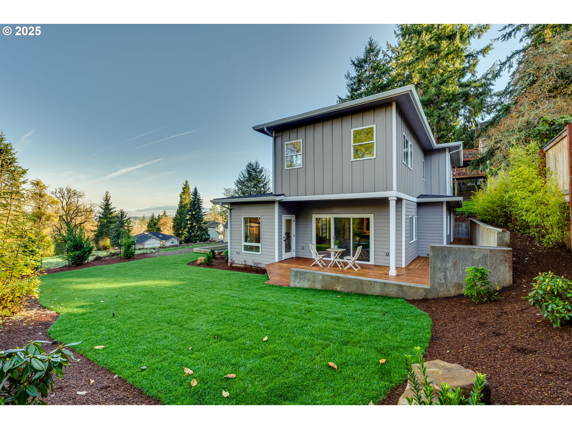 2240 West 25th Place Eugene, OR 97405 - Photo 44 of 48 a view of a house with a yard and sitting area