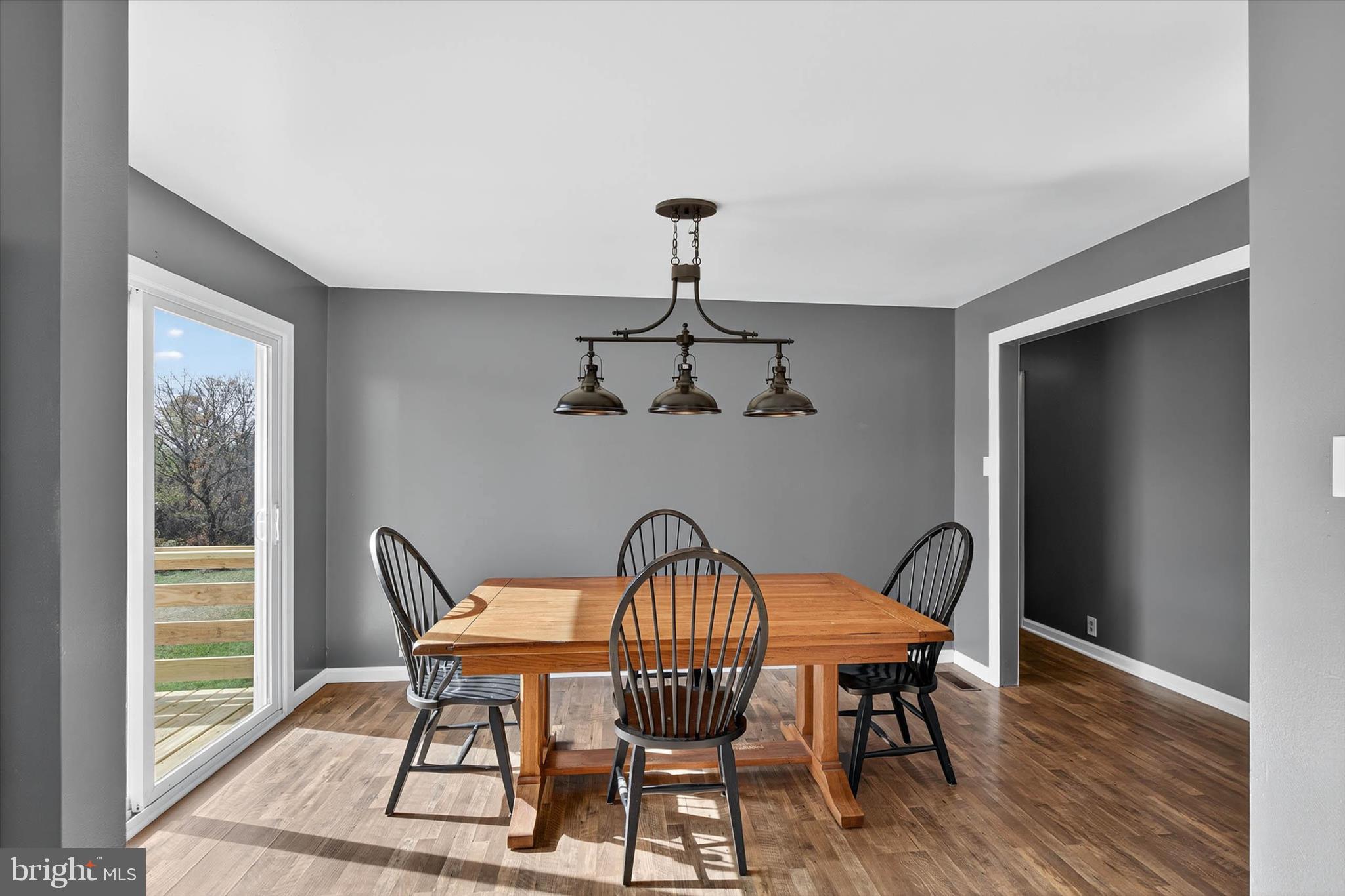 421 Million Dollar Road Halifax, PA 17032 - Photo 12 of 39 a view of a dining room with furniture window and wooden floor
