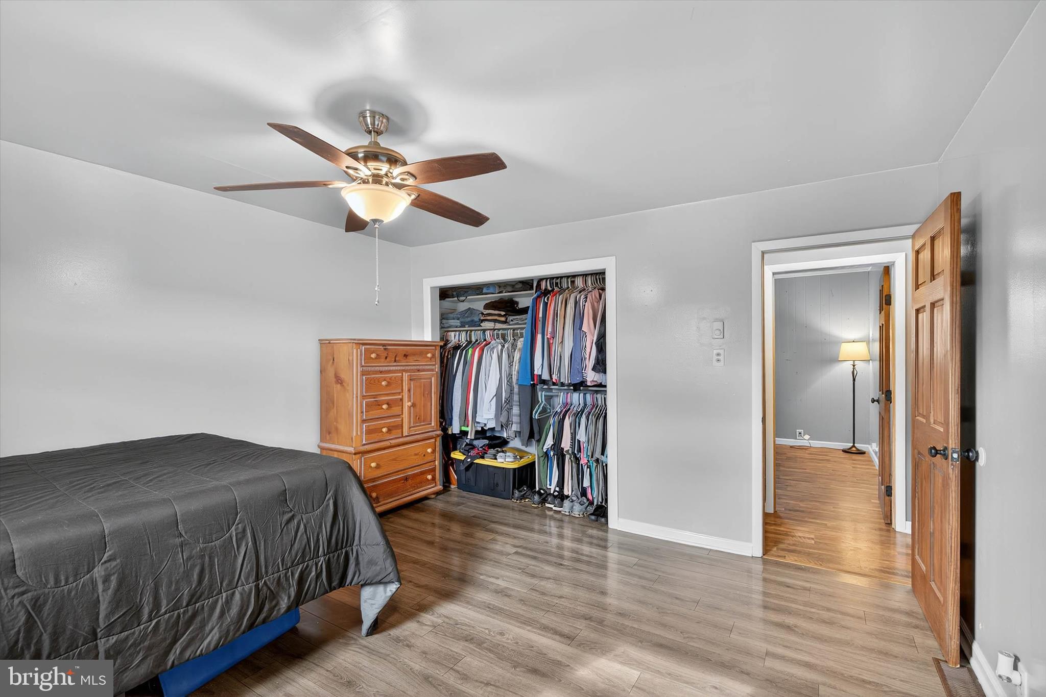 421 Million Dollar Road Halifax, PA 17032 - Photo 16 of 39 a bedroom with a bed and a chandelier