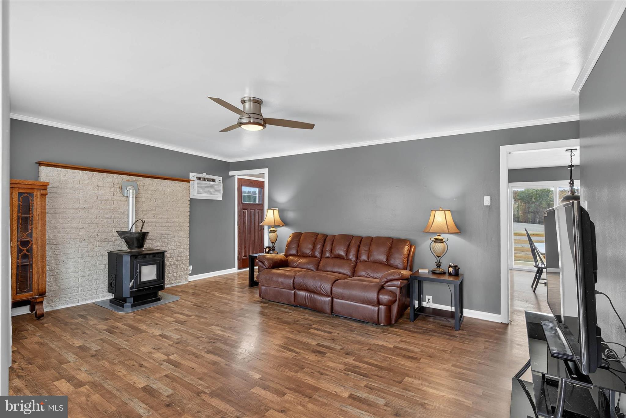 421 Million Dollar Road Halifax, PA 17032 - Photo 5 of 39 a living room with furniture and a flat screen tv with wooden floor
